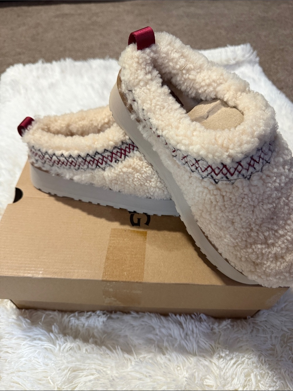UGG Women's Cream Shearling Slip-On Mules with Red Tab